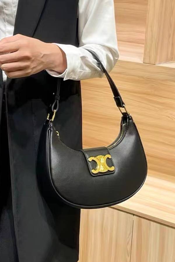 Retro metal buckle crescent bag