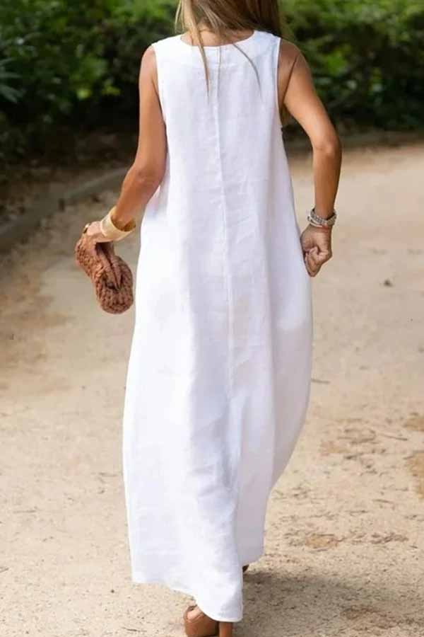 Deep v-neck sleeveless long white cotton and linen dress